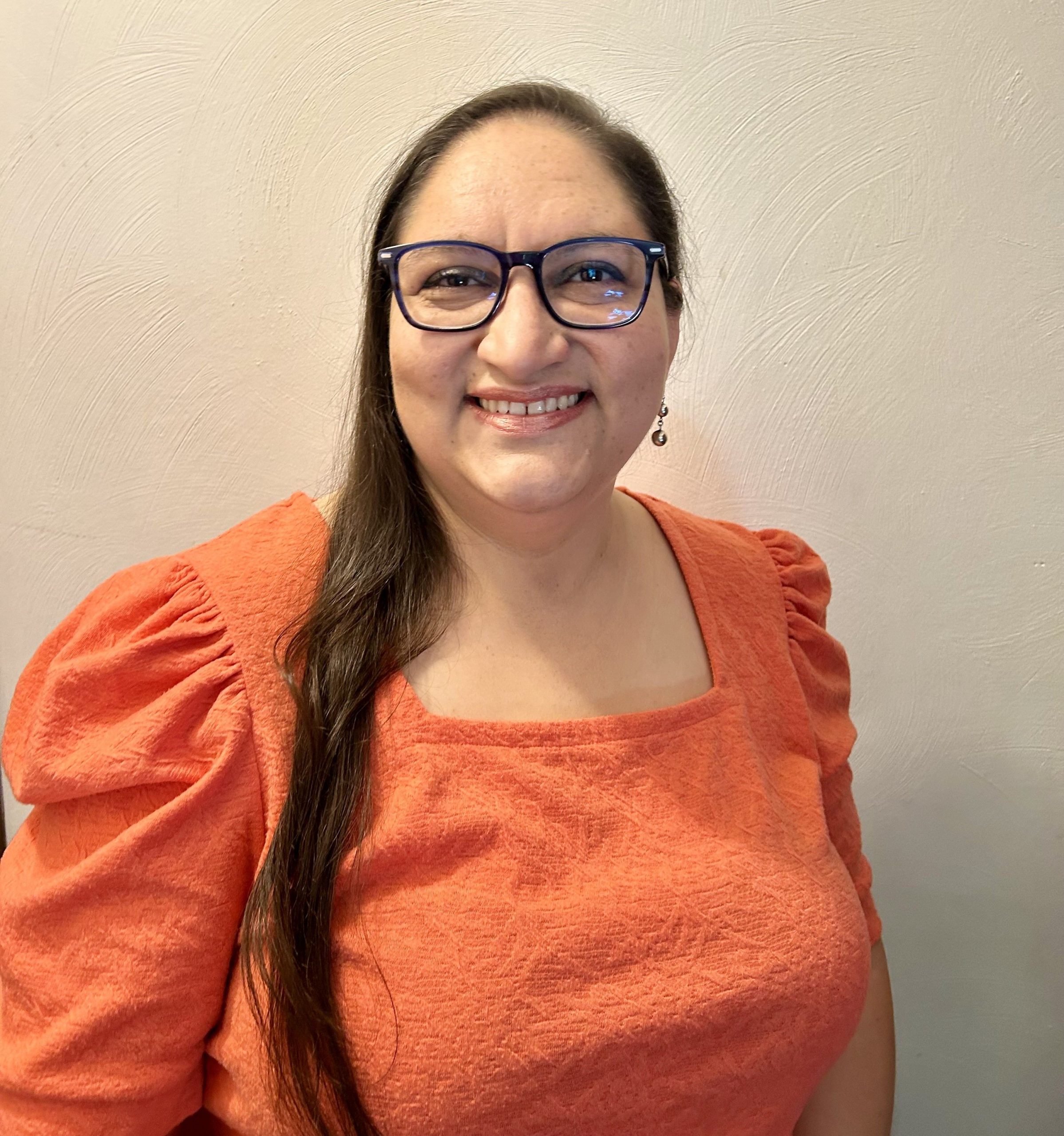 Headshot photo Mirella Roman-Molina.